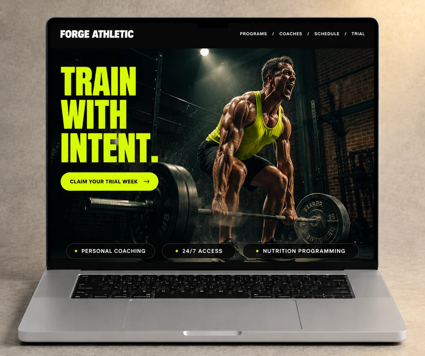 Forge Athletic gym website shown on a laptop